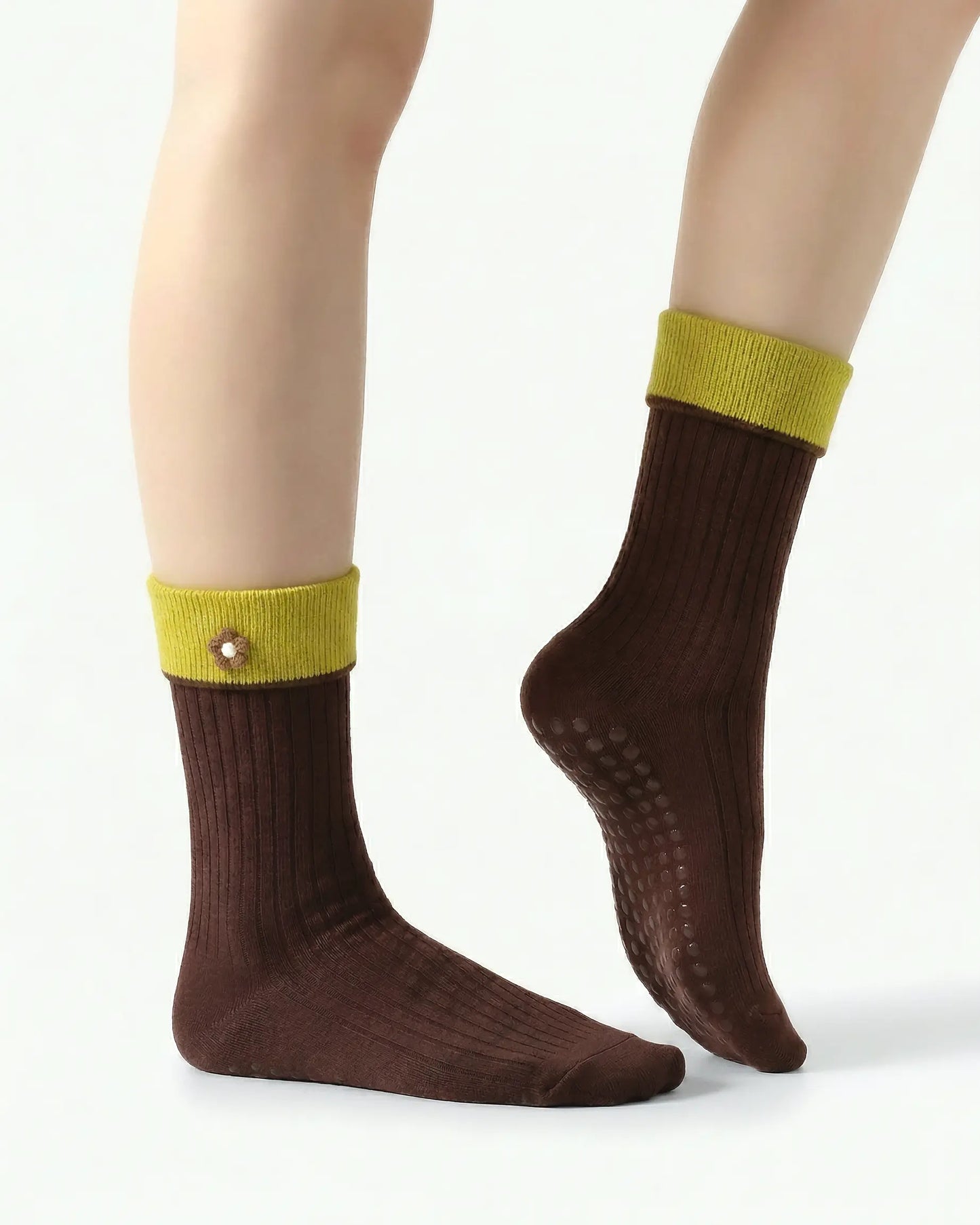 brown | 03 | Brown floral detail crew grip socks side detail view showing fold-over contrast cuff, ribbed crew silhouette, and floral embroidery accent