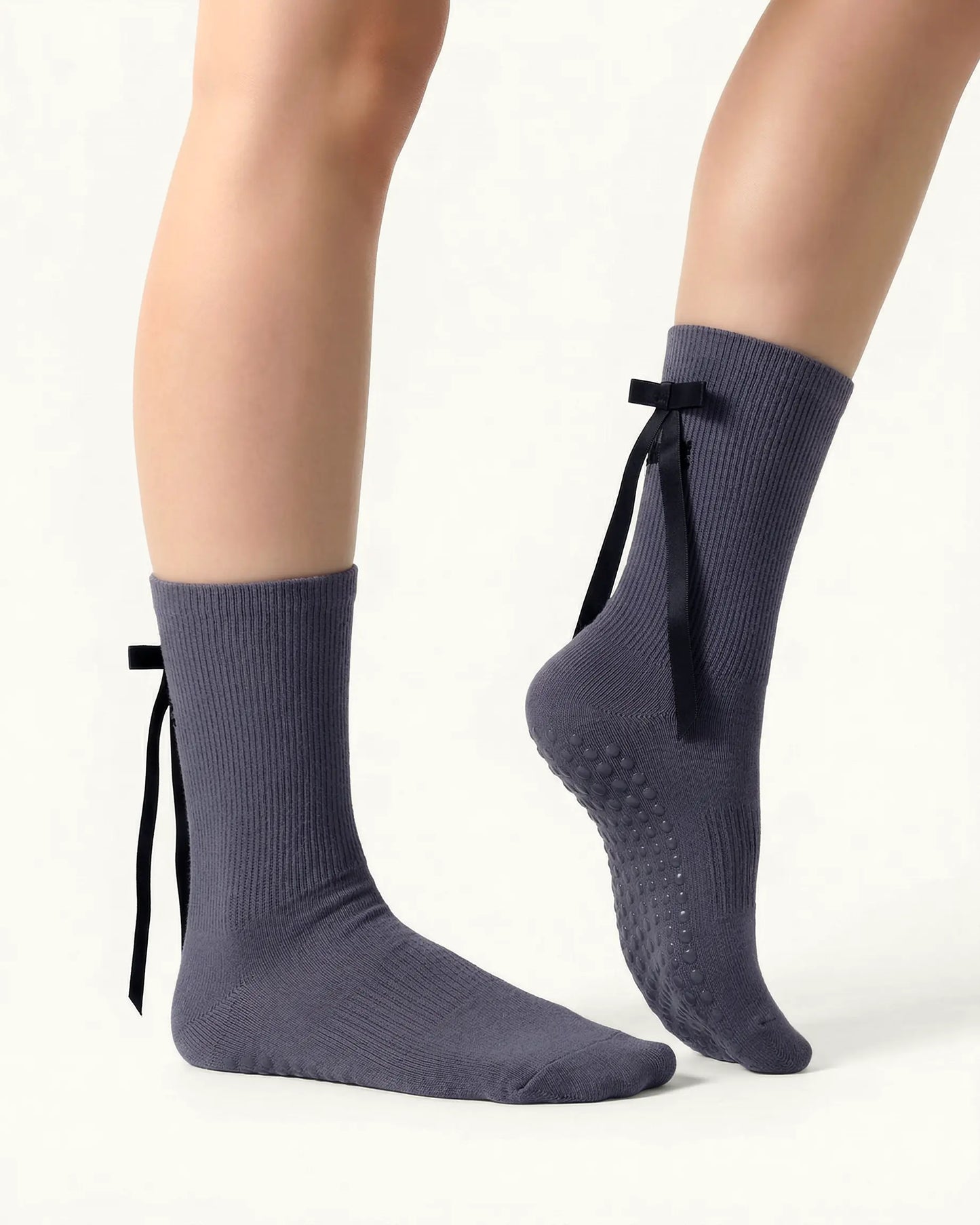 dark-grey | 03 | Dark grey ballet ribbon crew grip socks side detail view showing satin ribbon bow, ribbed cuff, and ballet-inspired styling