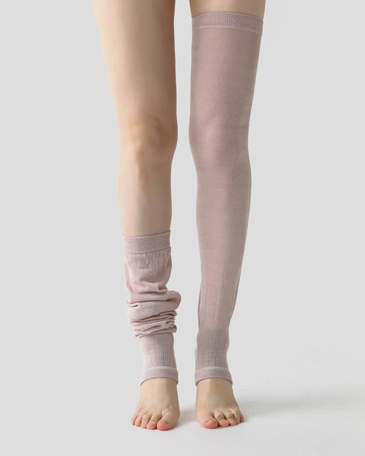 dusty-mauve | 02 | Dusty mauve ballet stirrup leg warmers styling comparison showing one leg worn fully extended and the other softly scrunched