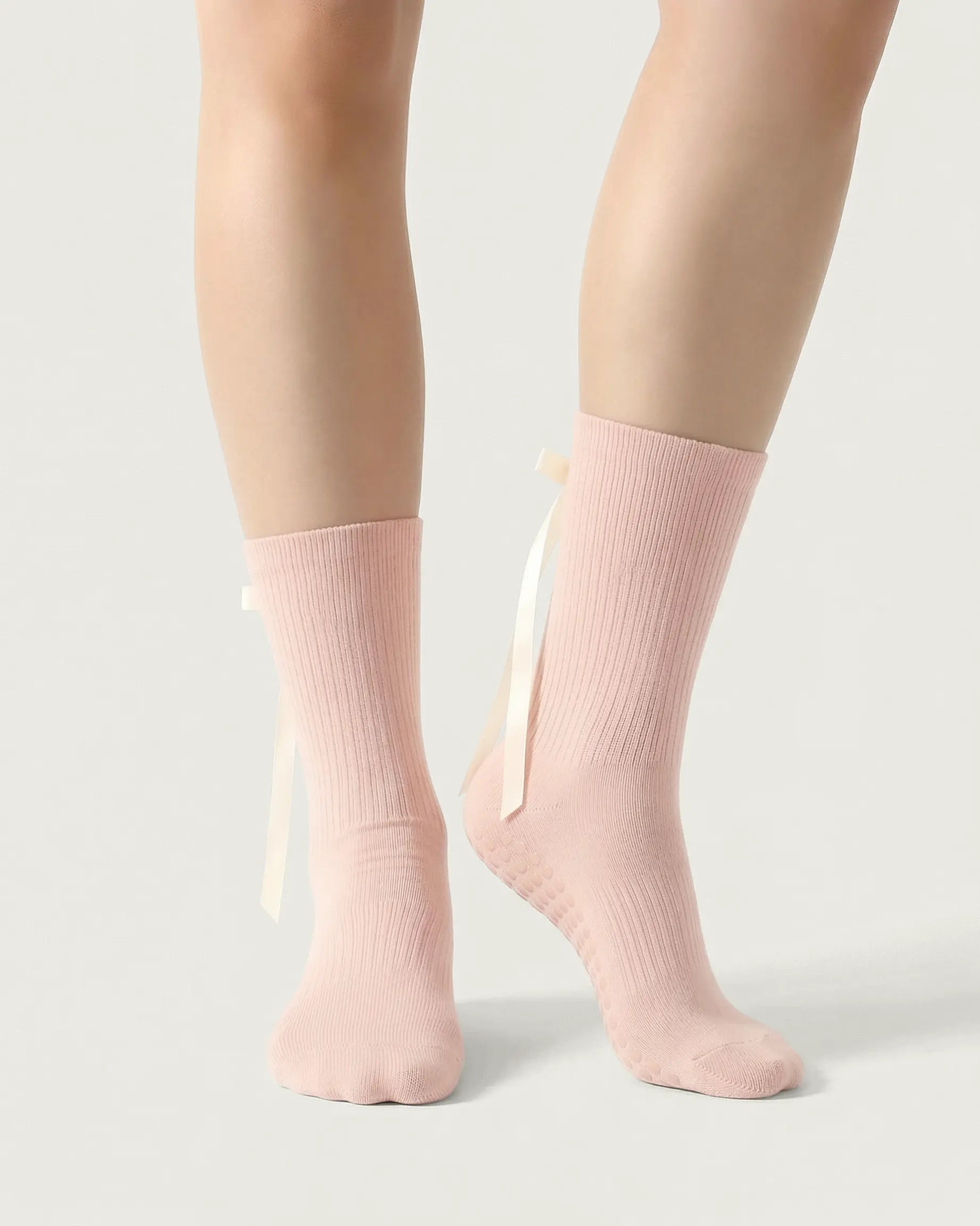 pink | 04 | Pink ballet ribbon crew grip socks front standing view showing clean crew silhouette, ribbon side detail, and minimal non-slip styling