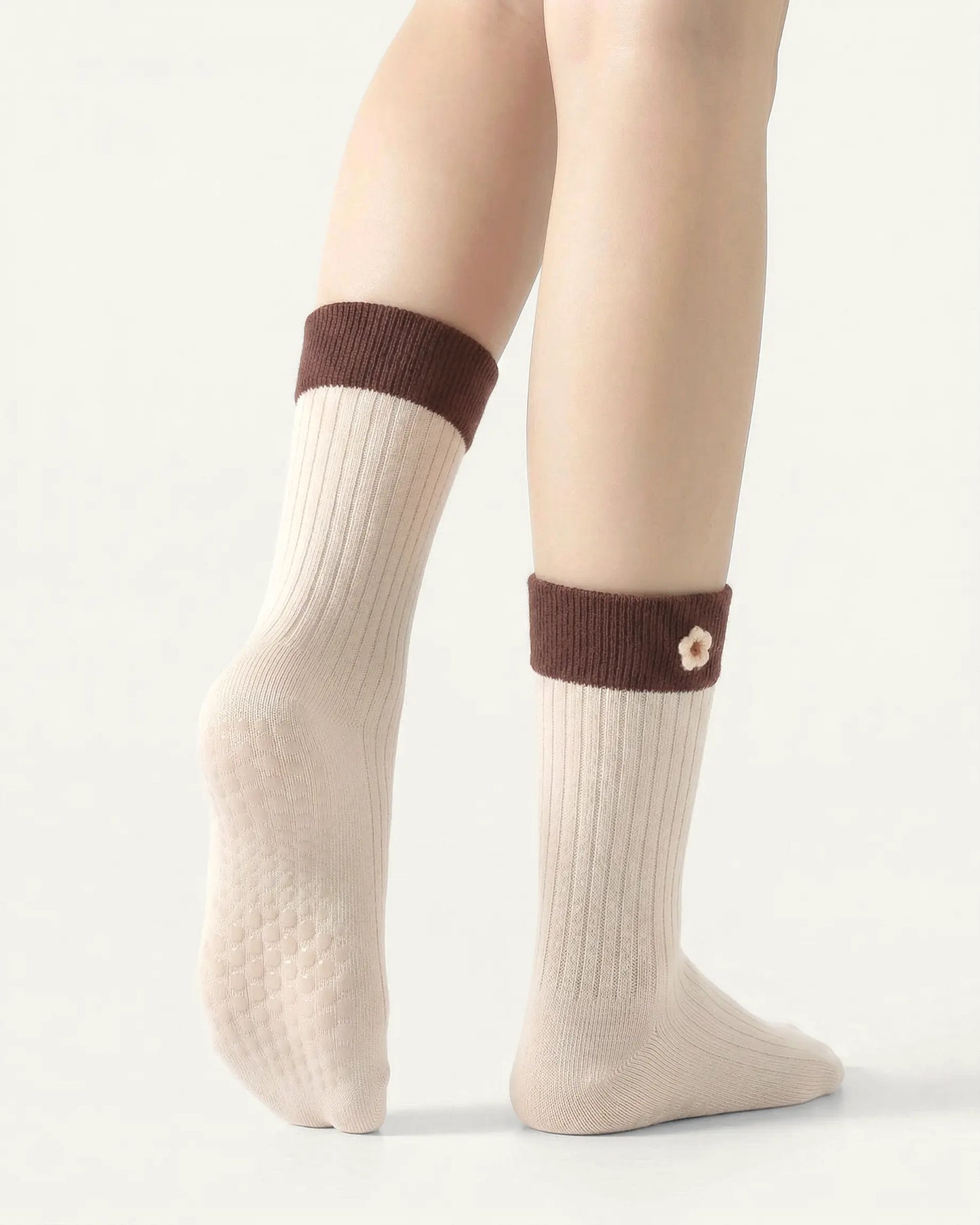 white-apricot | 02 | White apricot floral detail crew grip socks back side view showing grip sole detail, contrast cuff, and flower embroidery on fold-over cuff
