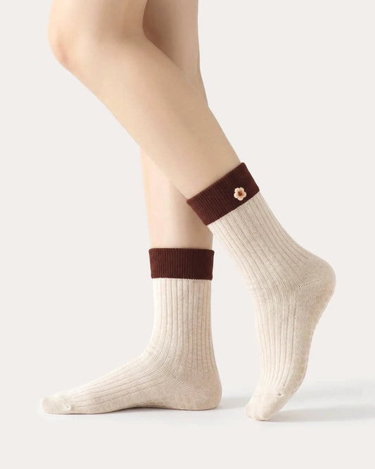 white-apricot | 01 | White apricot floral detail crew grip socks side standing view showing contrast cuff, ribbed knit texture, and small flower embroidery detail