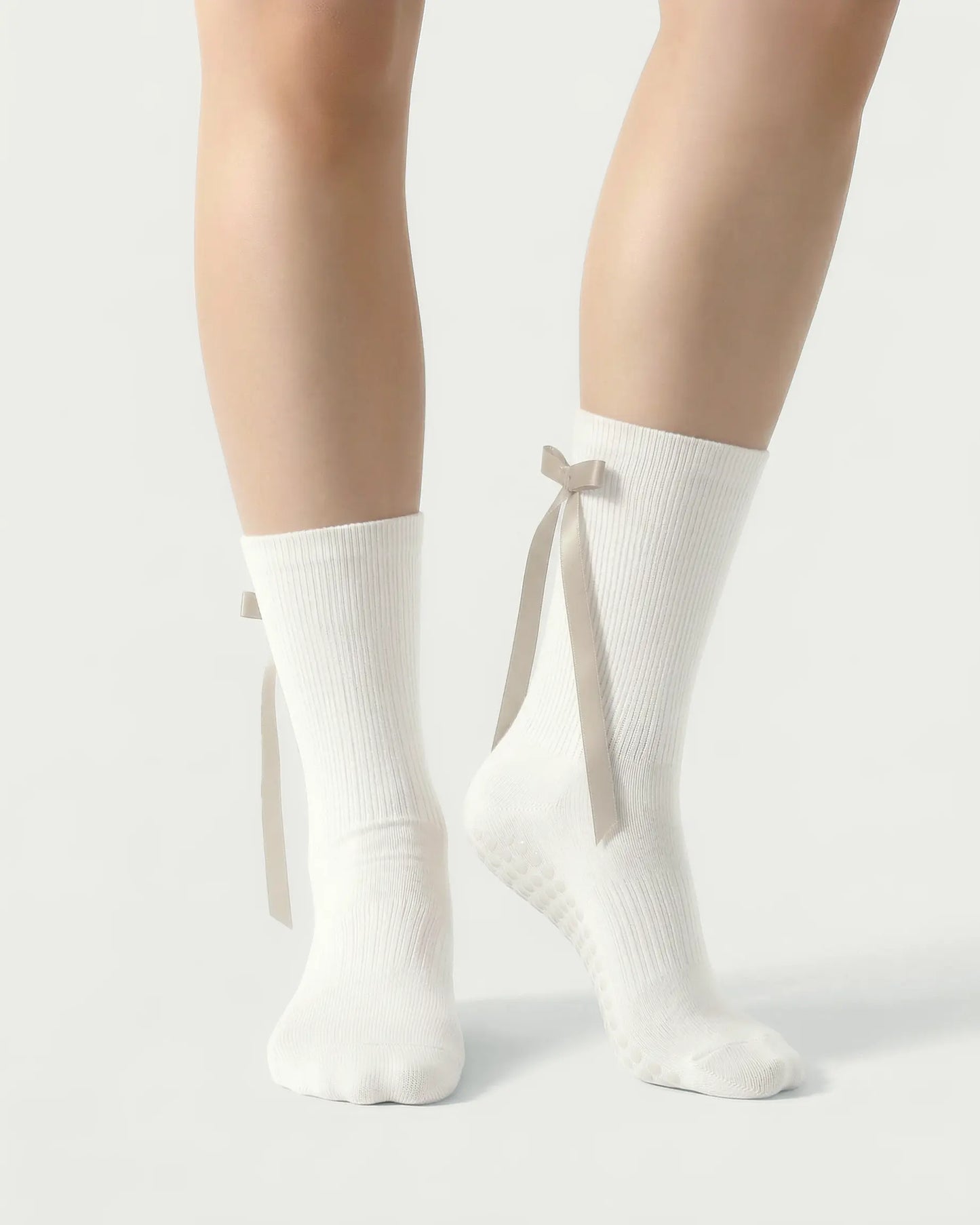 white | 04 | White ballet ribbon crew grip socks front standing view showing clean crew silhouette, ribbon side detail, and minimal non-slip styling